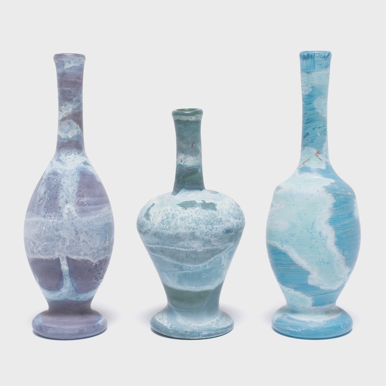 Three small vessels, designed to collect tears